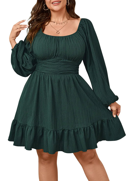Green dress with long sleeves and ruffled hem on a white background